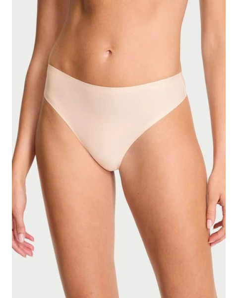 Еластичні безшовні трусики-стрінги Victoria's Secret Body by Victoria Flex Mid-Rise Thong Panty Бежеві